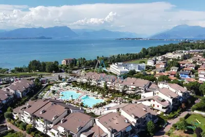 Image de Orchidea Apartment - trois piscines et un bar Ă 200 m du lac