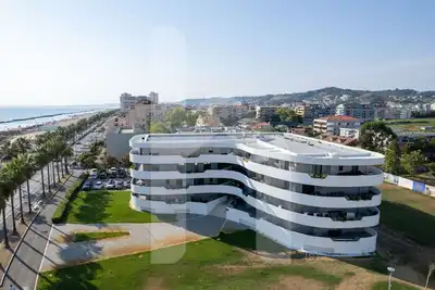 Homiday - WaterFront Int. 7, Three Bedroom Beachfront Apartment