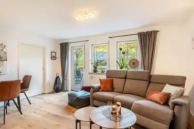 Image de Appartement 'Ferienwohnung Bachlauf Eslohe' avec vue sur les montagnes, terrasse privée et Wi-Fi