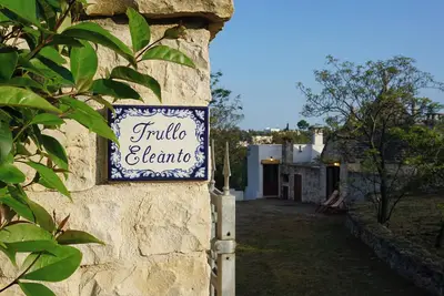 Image de Trullo surrounded by greenery, olive groves and orchards, in the heart of the Itria Valley
