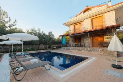 Image de Charming 4-bedroom estate with WiFi, swimming pool and Ac in enchanting Fethiye
