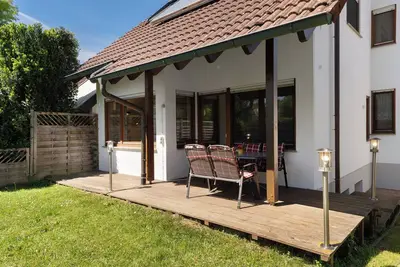 Image de Maison de vacances '110qm, 4 Schlafzimmer' avec terrasse privée, jardin privé et Wi-Fi