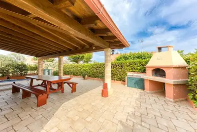 Image de Maison de vacances 'Villetta Cosimo' avec piscine partagée, jardin privé et climatisation