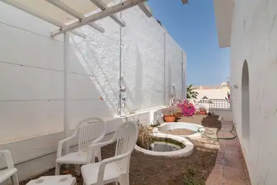 Image de Appartement de vacances 'Apartamento Con Jardín' avec vue sur les montagnes, jardin privé et Wi-Fi