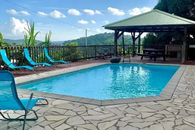Image de Homerez - Bel appartement à Ducos avec piscine privée