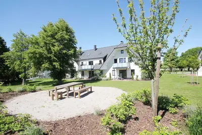 Image de Beachfront apartment with terrace, use of swimming pool and sauna - Rex Rugia apartment 12-1