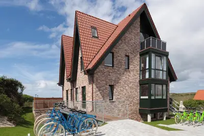 Comfortable vacation home Juist: dune view, 5 bedrooms, 4 bathrooms, guest Wc, fireplace, barbecue