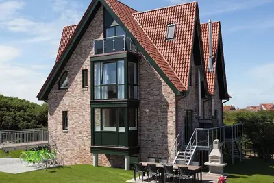 Comfortable vacation home Juist: dune view, 4 bedrooms, 4 bathrooms, guest Wc, fireplace, barbecue