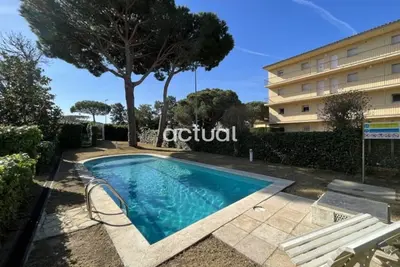 Image de Appartement rez-de-chaussée S'Agaró avec jardin, piscine, WiFi, parking et climatisation