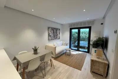 Image de Appart neuf, centre de Platja d'Aro, 2 ch, jardin, parking, Wifi, clim