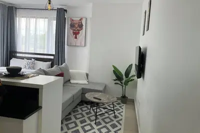 Image de A cozy studio apartment ideal for a getaway, a quiet place for work and rest!