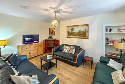 Spacious five-bed retreat with many original features, modern comforts, and a private hot tub.
