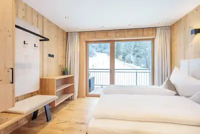 Image de Appartement \"Mountain Suite Nr°101\" avec vue sur les montagnes, jardin partagé et Wi-Fi