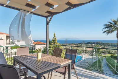 Image de Appartement 'Oneiro - Deux Chambres' avec Vue sur la Mer, Wi-Fi et Climatisation