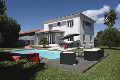 Image de La Villa Palmier - Piscine avec Grand Jardin