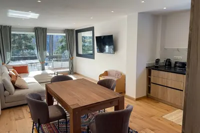 Image de Très bel appartement face aux pistes avec terrasse, cave vélo et local ski