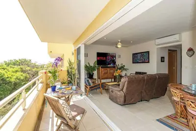 Image de 6 couchages, vue et plage à 1 pâté de maisons