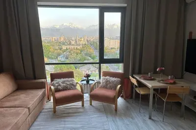 Image de Mountain and city view from the heart of Almaty! Nice location, new and safe