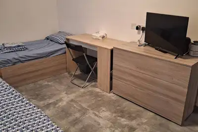 Image de Chambre privée et confortable dans un penthouse de banlieue moderne