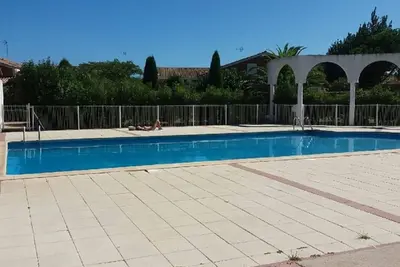 Image de Pavillon 2 Pièces avec Terrasse, Piscine et Parking à 600m de la Plage