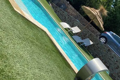 Image de Logement Neuf avec Piscine & Jardin – Idéal Familles ou Amis