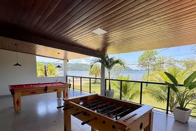 Image de House 15 meters from the beach in a condominium with \"feet in the sand\"