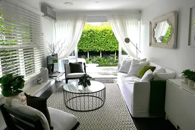 Image de The Urban Haven - A serene city retreat, a lovely garden, close to trendy cafes.