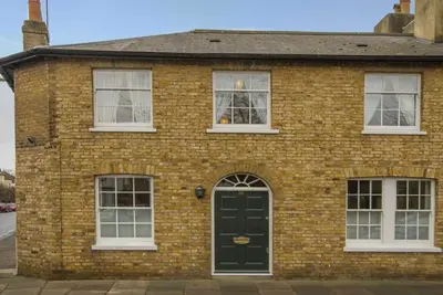 A luxury family friendly Georgian home in Hampton, set on a tree lined triangle.