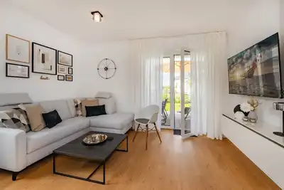 Image de Cozy vacation home \"Domizil zum Lerchengrund 01\" in Ückeritz near the beach