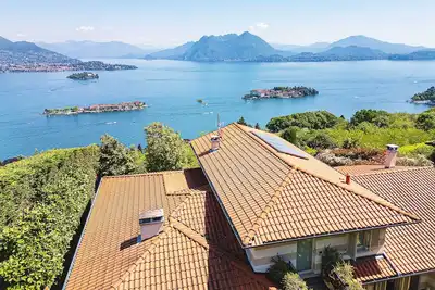 Image de Exquisite villa with pool and breathtaking views over the lake! - Villa Nora