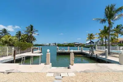 Image de Blue Marlin House ~ Waterfront Pool Home, Steps from the Beach, Hot Tub, 210' Dock