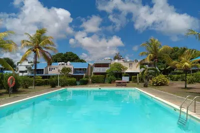 Image de Appartement Cosy avec Terrasse, accès Piscine à Grand Baie– À 10 Min de la Plage