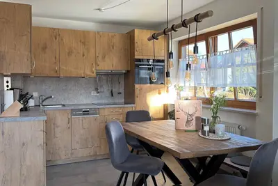 Image de Newly furnished, cozy apartment! Hiking, cycling right on the doorstep