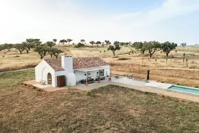 Image de Maison de vacances 'Monte De Santiago' avec vue sur les montagnes, piscine privée et Wi-Fi