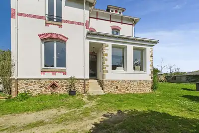 Image de Maison avec jardin pour 4 adultes et 2 enfants