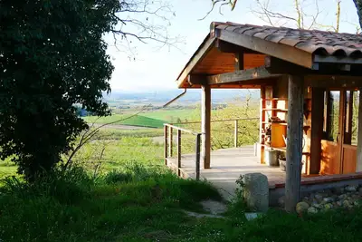 Image de Wake up to stunning views of the Pyrenees from our cosy glamping forge.