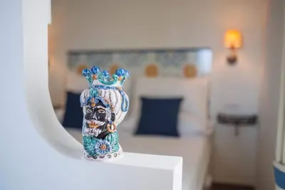 Image de Ottaviano Suite - Penthouse élégant avec vue sur la mer
