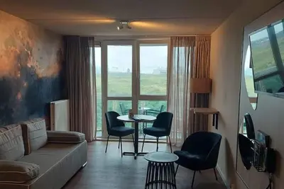 Image de Serene Beach Rooms – Ocean Breezes, Balcony, and Comfort Near Fletcher - 3 Units