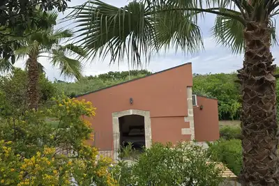 Image de Studio 'Maria Costanza' avec piscine partagée, Wi-Fi et climatisation