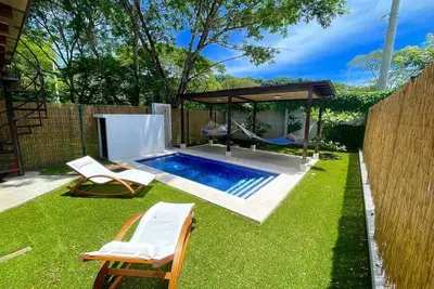 Image de This house is a 4 bedroom(s), 3. 5 bathrooms, located in JacĂł, Ciudad del Mar, Puntarenas Province.