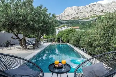 Image de Maison de vacances Krvavica pour 1 - 6 personnes avec 3 chambres Ă coucher - Maison de vacances