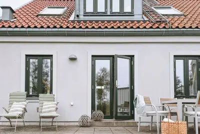 Family-friendly accommodation with pool & tennis court near Torekov Golf Club