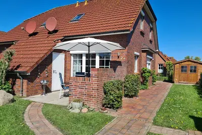 Image de New: Top vacation home with garden, fence, Wlan, south-facing terrace, ideal with child + dog