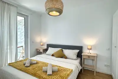 Image de HolidayHome Apartments | Airport Deluxe Condo with Terrace