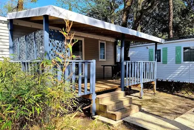 Image de Mobilhome Confort 22-28m² - 2 chambres - terrasse couverte + Tv 6 personnes