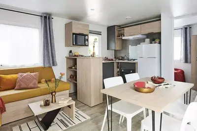 Image de Mobil home Premium 2 Ch - 4 Pers 32m² - Tv + Lv + Clim + Lit 160 + Draps (inclus à la semaine) 4 personnes