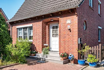 Image de Appartement \"Gemütliche\" avec terrasse partagée, jardin partagé et Wi-Fi