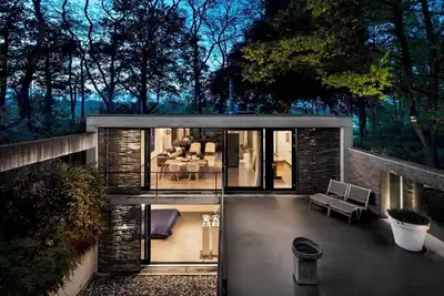 Beautiful wellness villa in nature on the Bergvliet estate with unique architecture, with a golf course in front of the door