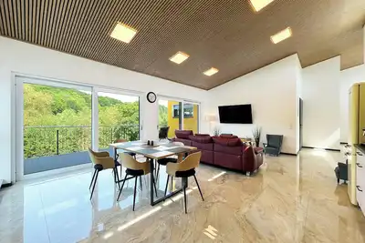 Image de Luxurious 4-room penthouse with jacuzzi, roof terrace, parking space, e-charging station