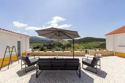 Image de Casa do FogĂŁo de Lenha - Cavalo de TrĂłia Villas